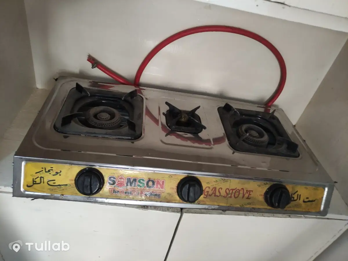 Gas stove, water heater, sofa with mattress